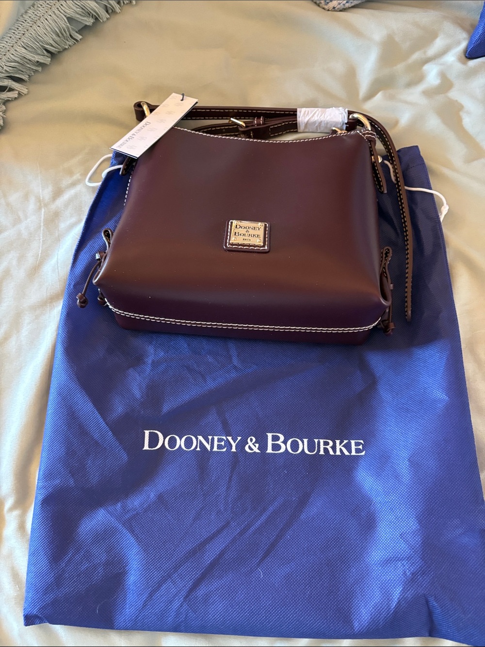 NWT Dooney & Bourke Plum Leather Crossbody with Gold Logo Plate